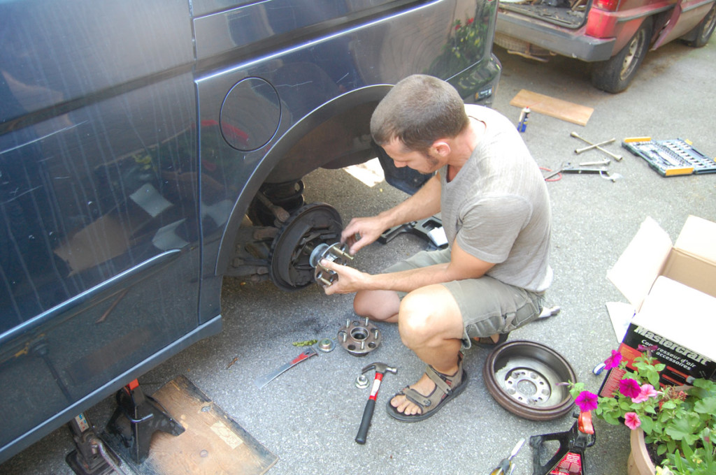 This was the scary part - it was hard to get the new hub onto the axle. But,with grease, tapping, and the help of the axle nut, we got it.