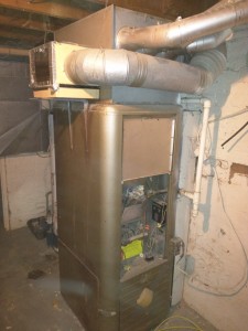Egads! This is the furnace that came with an old Victorian house I'm currently helping some friends renovate.